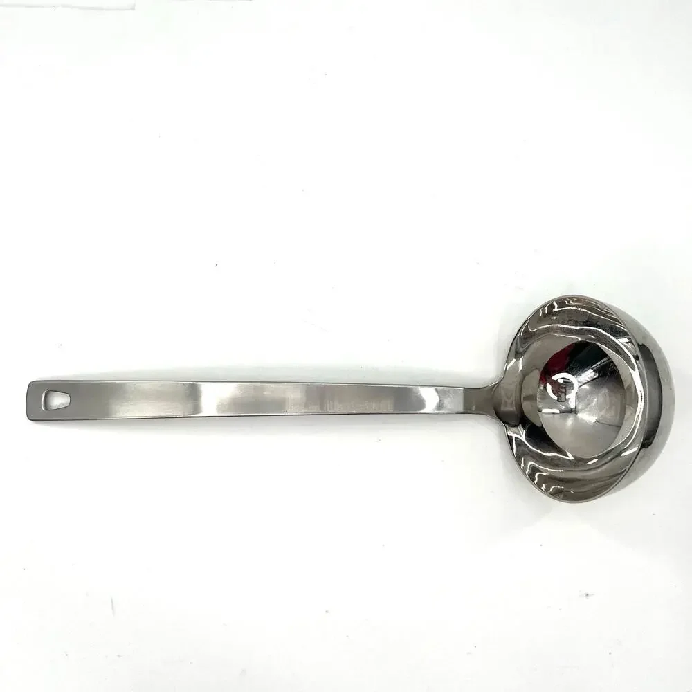 Williams Sonoma stainless Steel ladle with hole for hanging